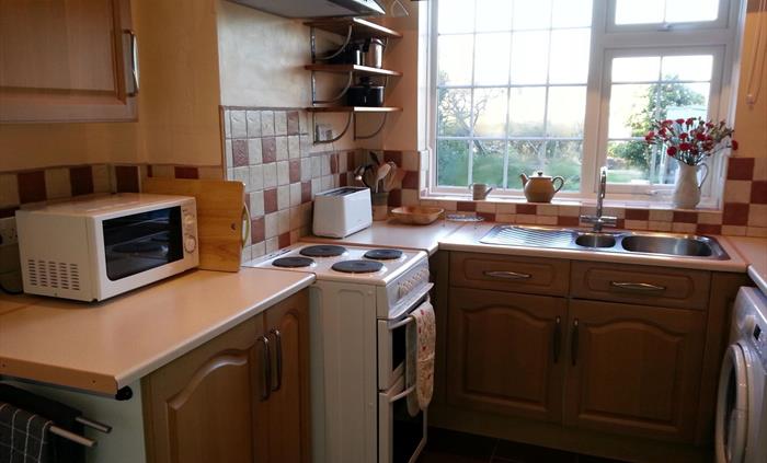Kitchen with view over rear garden